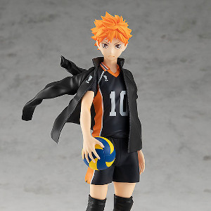 Volleyball player Shoyo holding a volleyball with his jacket on shoulder